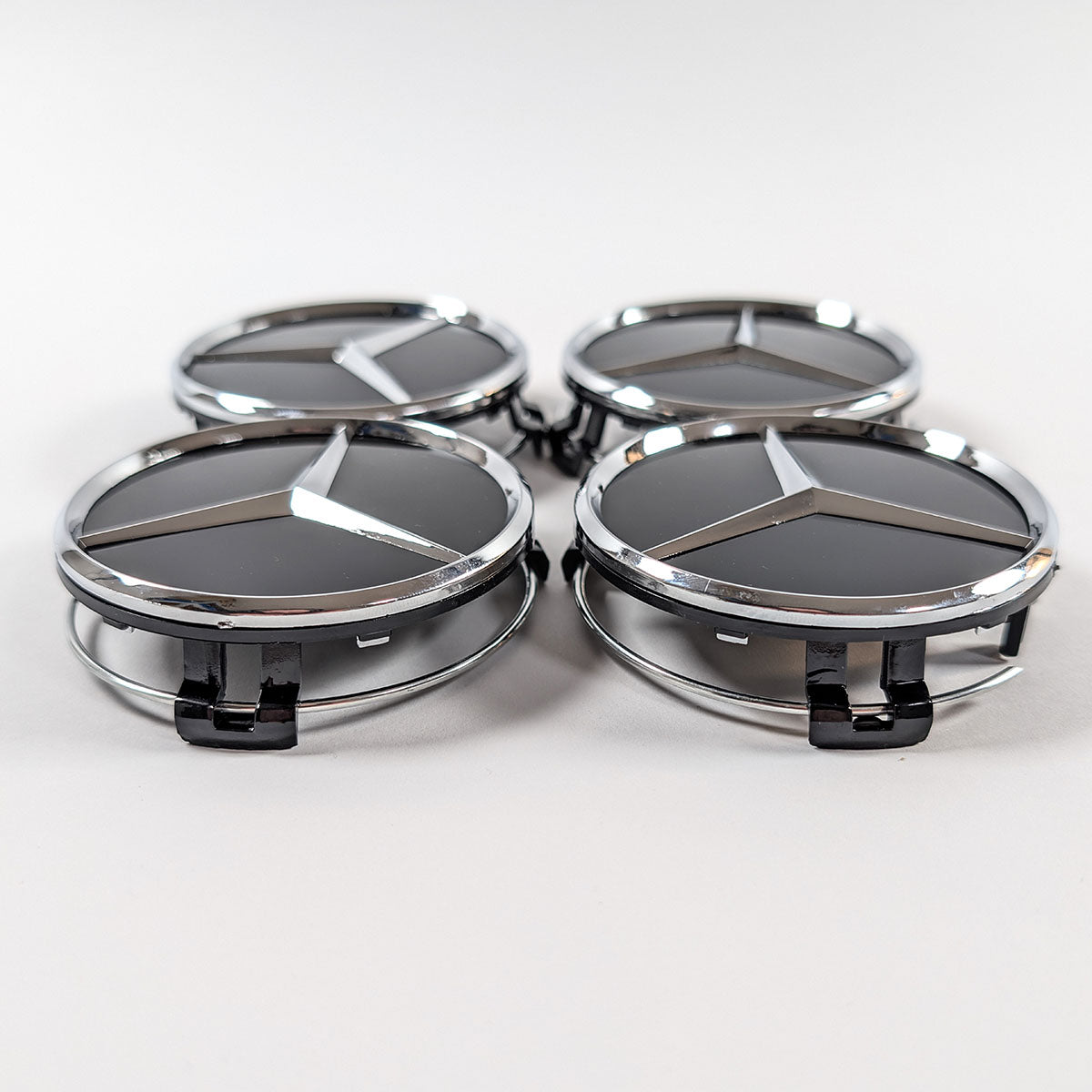 Vier Nabendeckel für Mercedes-Benz Felgen, 75mm Außendurchmesser, Ausführung Schwarz Glanz und Chrom