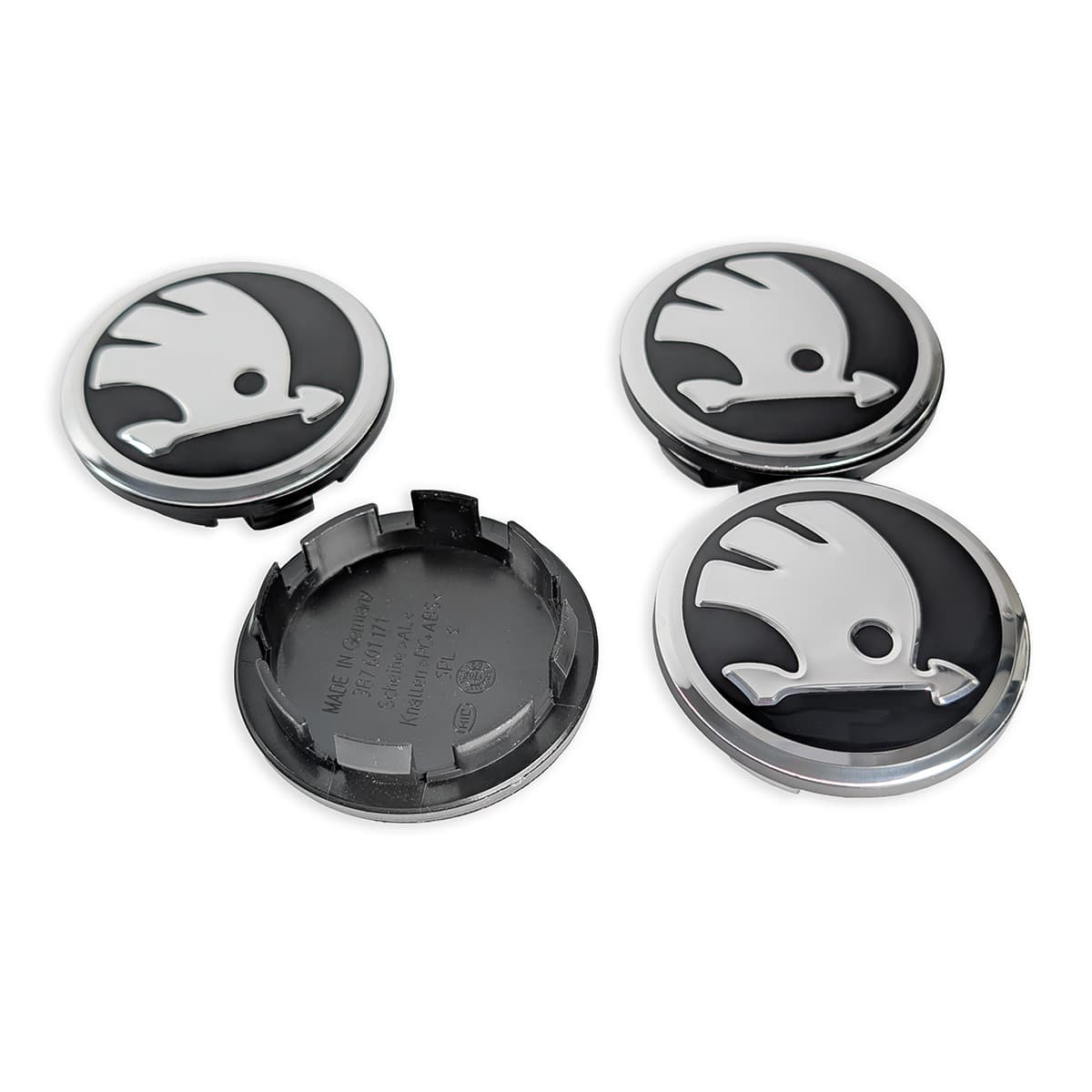 Rückseite und Vorderseite der Skoda Felgendeckel 65mm mit Halteklammern.